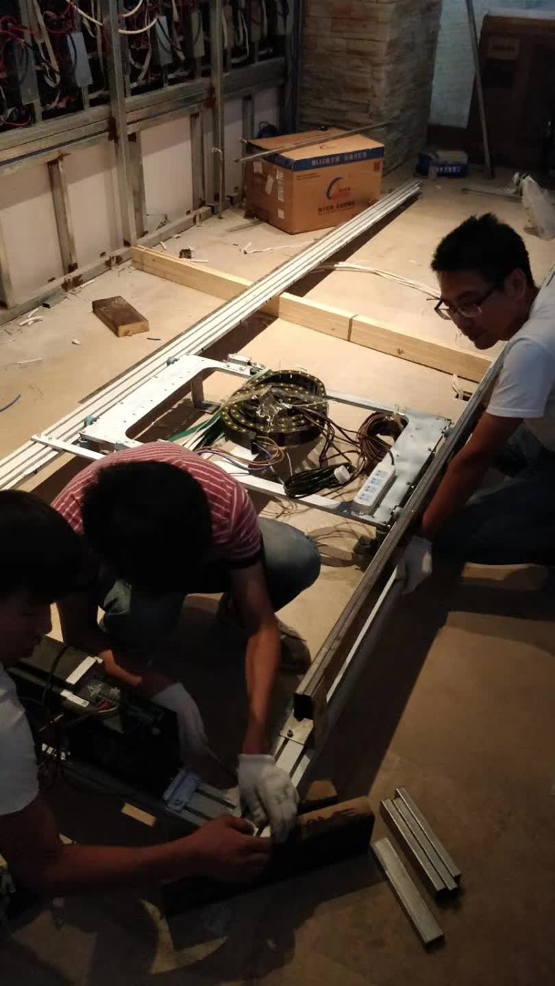 文安鲁能领秀展厅 五米滑轨电视 调试过程和最终样式 — 现场照片 3
